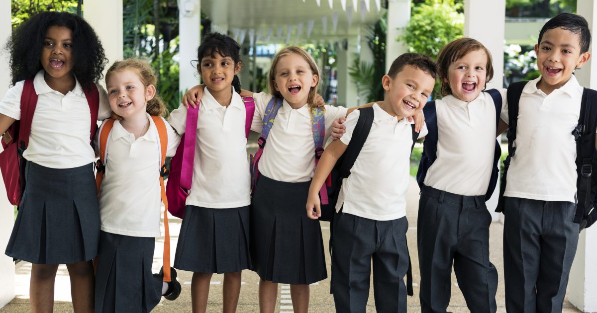 Group of happy primary school children