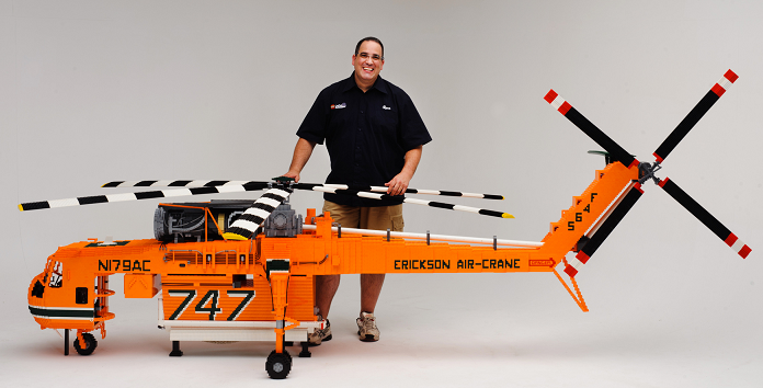 Ryan McNaught with his LEGO helicopter - one of the amazing works on display at the Brickman Experience.