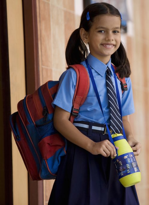 Female child in school uniform